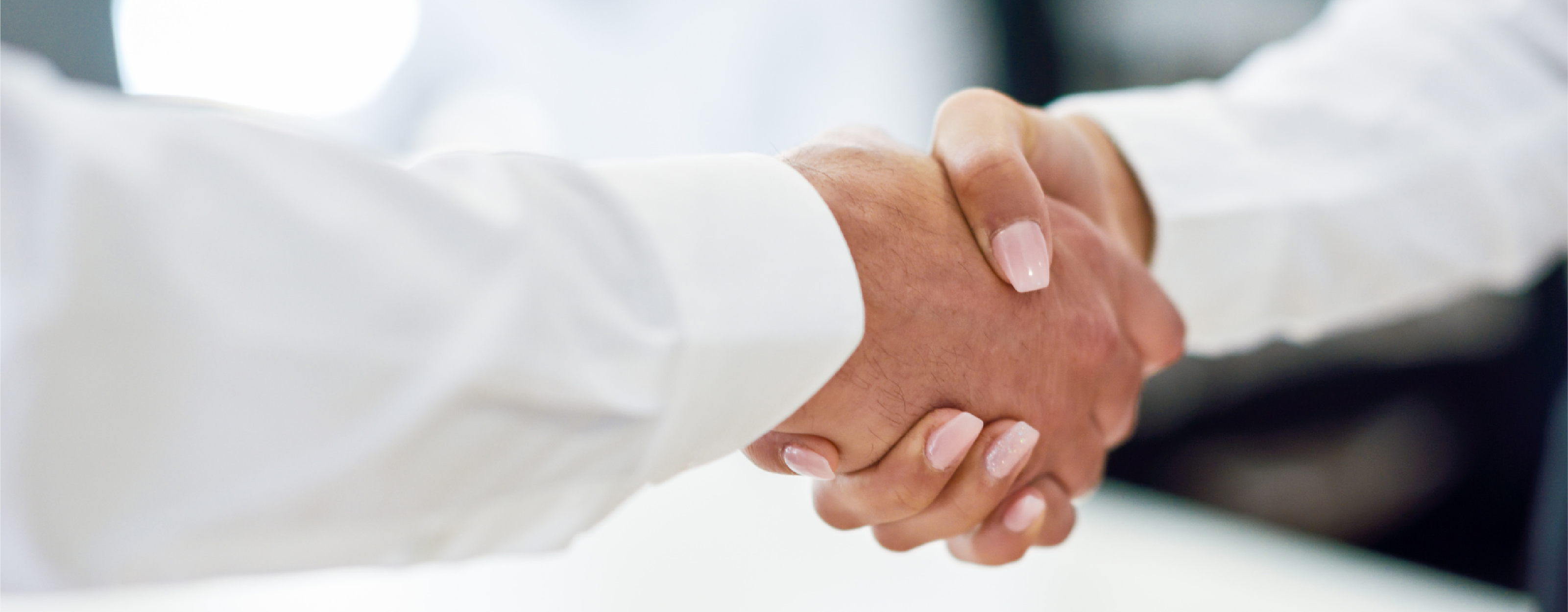 Man and women shaking hands