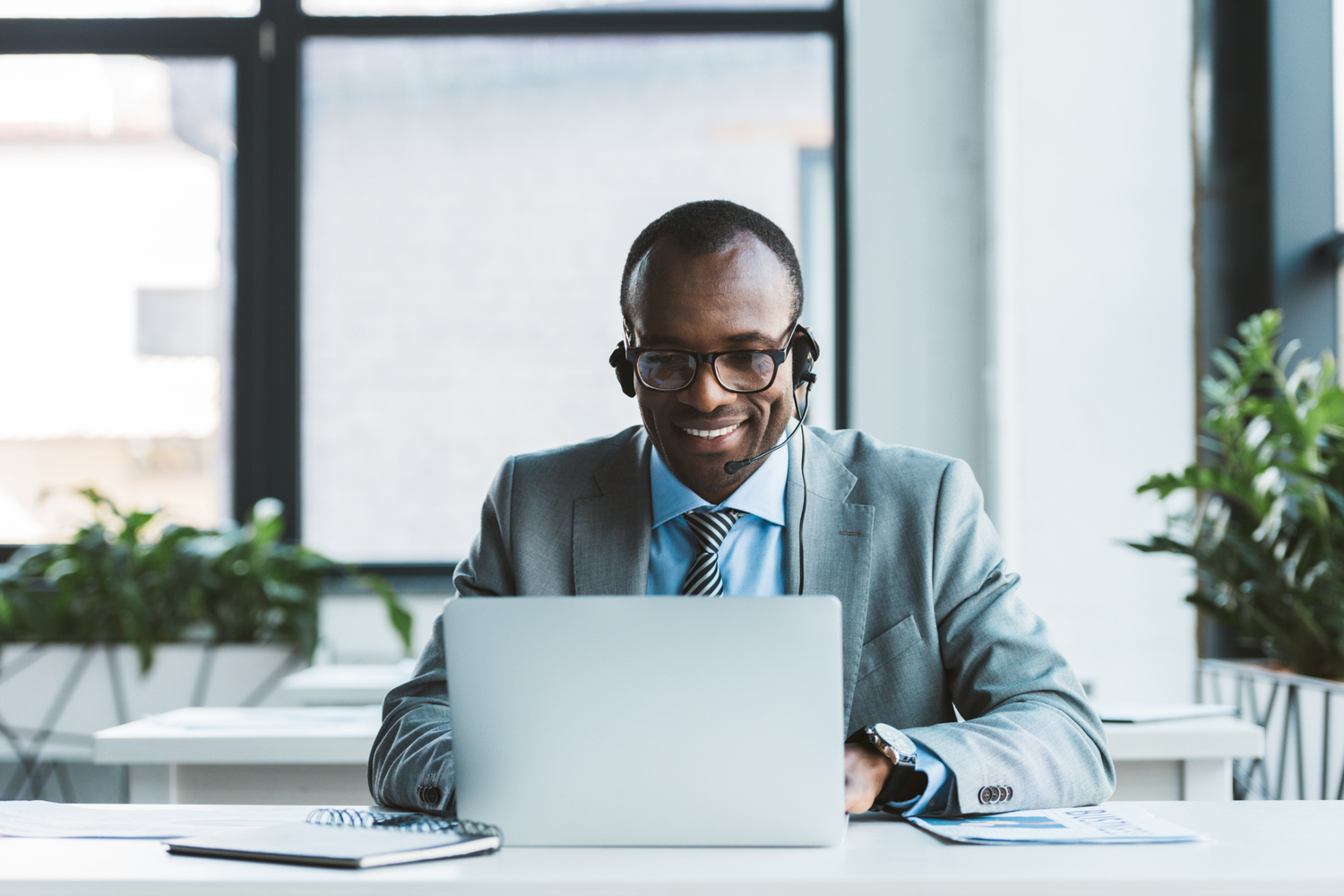 Male using a computer at an office